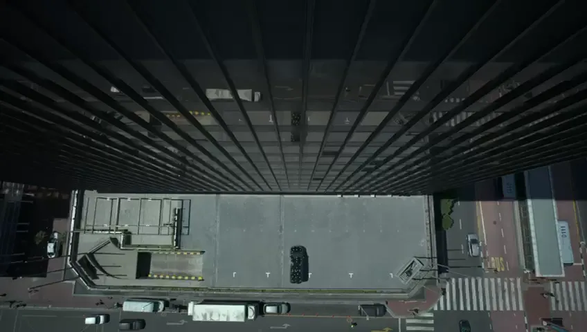 Truck under a highway, tracked from above